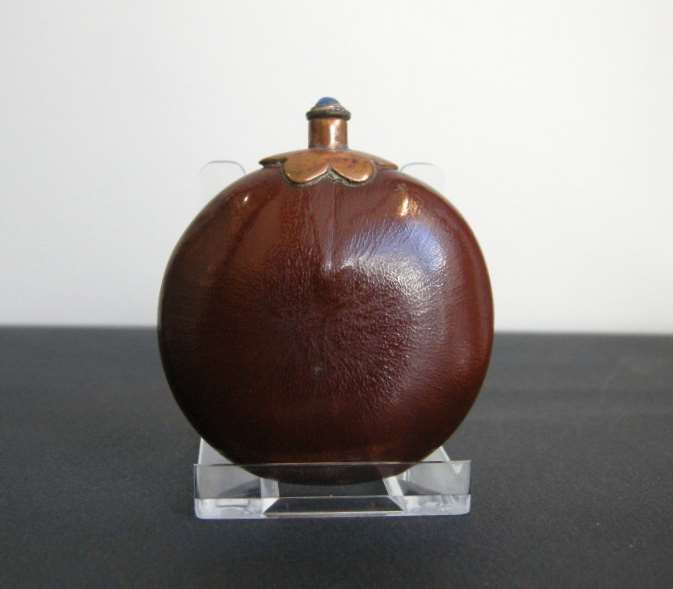 Snuff bottle seed pod with a copper metal collar